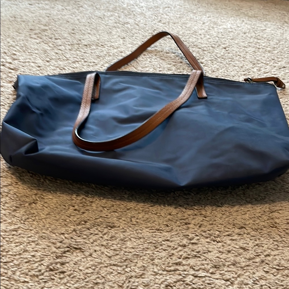 Stylish Navy Blue Tote Bag with Brown Straps by banana republic